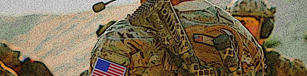 Close-up view of a soldier in military uniform with an American flag patch on the arm, holding a weapon.