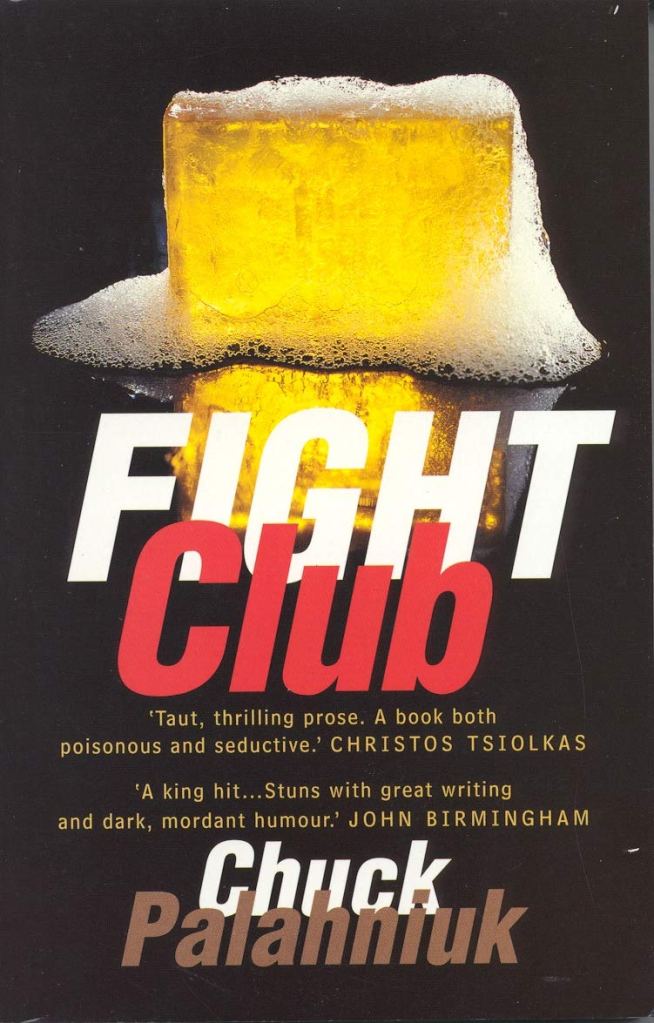 Cover of the book 'Fight Club' by Chuck Palahniuk, featuring a frothy beer glass on a black background with red and white text.