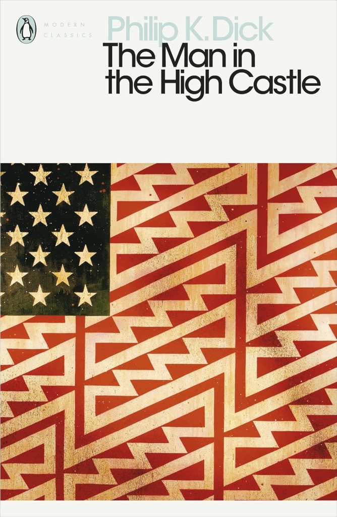 Book cover of 'The Man in the High Castle' by Philip K. Dick featuring an artistic representation of the American flag with geometric patterns.