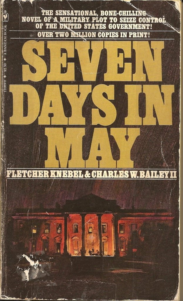 Cover of the book 'Seven Days in May' by Fletcher Knebel and Charles W. Bailey II, featuring bold yellow text with a depiction of a government building in the background.