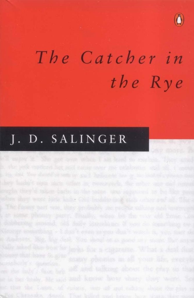 Cover of 'The Catcher in the Rye' by J.D. Salinger featuring a red background and bold black text.