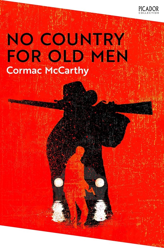 Book cover for 'No Country for Old Men' by Cormac McCarthy featuring a silhouetted figure holding a gun against a bright red background.