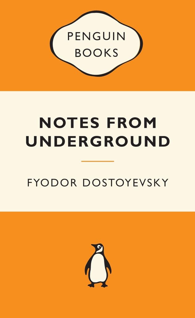 Cover of 'Notes from Underground' by Fyodor Dostoyevsky, published by Penguin Books, featuring an orange background with white and black text and a small penguin illustration.