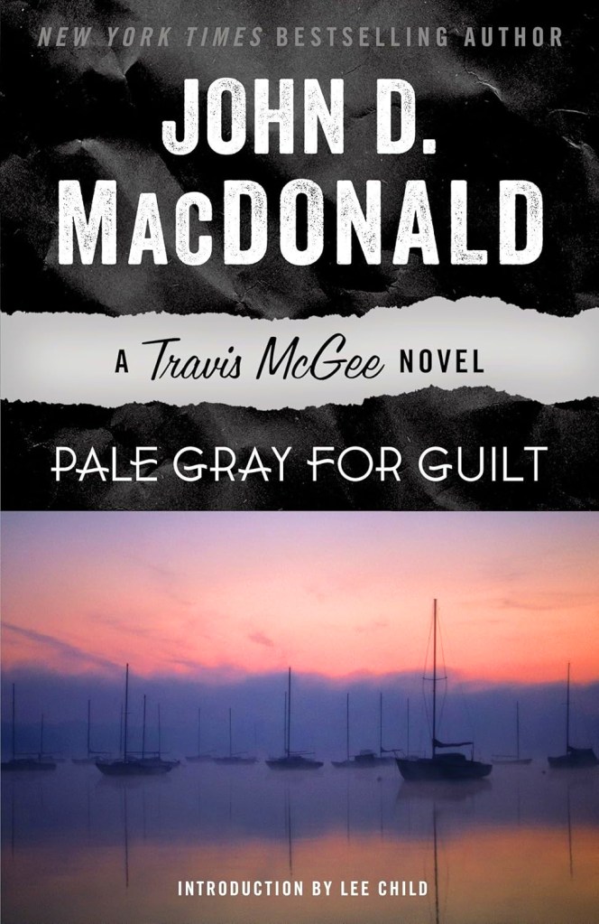 Cover of the book 'Pale Gray for Guilt' by John D. MacDonald, featuring a serene seascape with boats and a pinkish-orange sky.