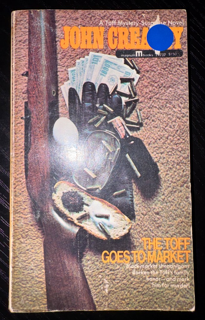 Cover of a mystery novel titled 'The Toff Goes to Market' by John Creasey, featuring a close-up of a hand wearing a black glove holding cash, with bullets scattered around and a blurred background.