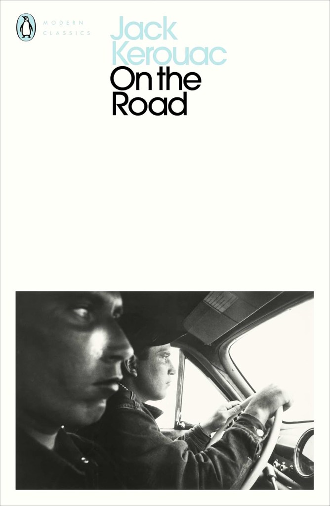 Cover of 'On the Road' by Jack Kerouac featuring a black and white photograph of two men in a car, one driving and one in the passenger seat.